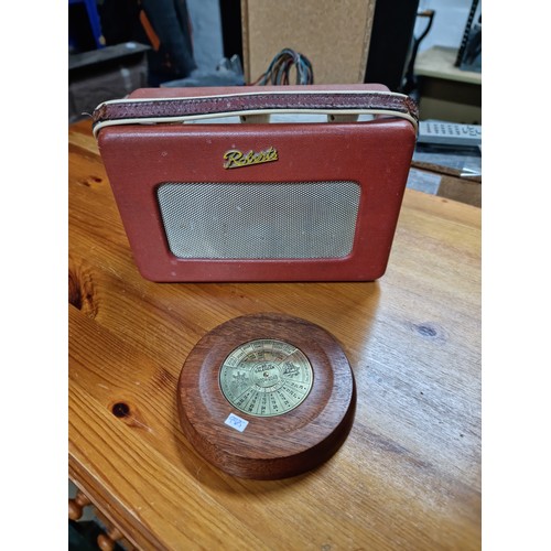 371 - A small portable Roberts transistor radio model R-200, battery operated with built in aerial, along ... 