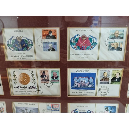 28 - Large framed and glazed set of First Edition First Day covers of the Winston Churchill stamp set con... 