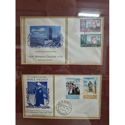 28 - Large framed and glazed set of First Edition First Day covers of the Winston Churchill stamp set con... 