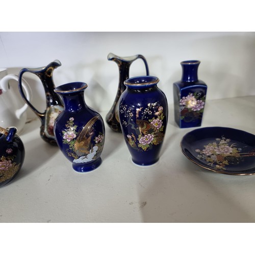 10 - 3x shelves of collectable ceramics and glass ware to include a collection of 6x oriental floral deco... 