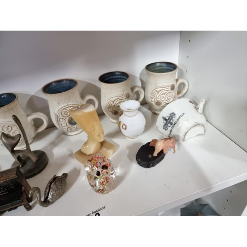 23 - 2x shelves containing a large quantity of collectables inc 6x Welsh studio pottery mugs, 2x Japanese... 