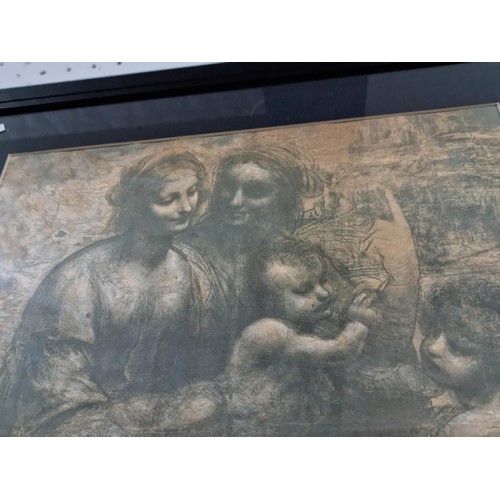 33 - Framed and glazed Leonardo da Vinci print depicting Virgin Child with St. John the Baptist and St. A... 