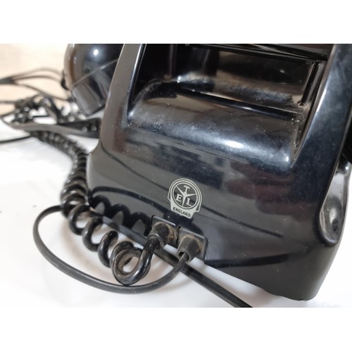 38 - Vintage black rotary telephone , has a carry handle added under the receiver, in good order, dial tu... 