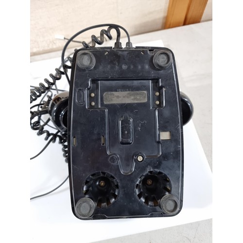 38 - Vintage black rotary telephone , has a carry handle added under the receiver, in good order, dial tu... 