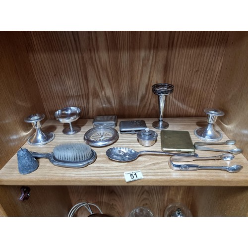 51 - Shelf full of collectable silver plated ware including 2x cigarette cases, 2x pairs of sugar tongs, ... 