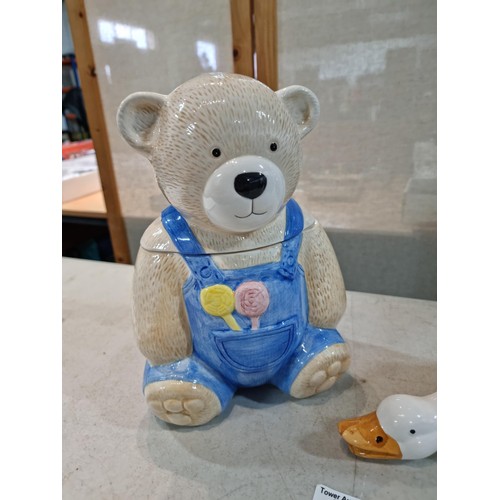 53 - Large teddy bear cookie jar in striking colours along with a ceramic goose, both have no chips or cr... 