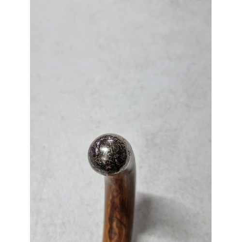 61 - Good quality hallmarked silver topped cane walking stick, with a lightweight aluminum shaft and meta... 