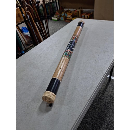 63 - Good quality fair trade rain stick with decorative turtle image to the side has a length of 80cm