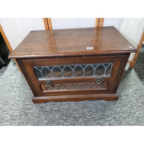 456 - Vintage solid oak tv cabinet in the priory design featuring a large drawer below which has a lead li... 