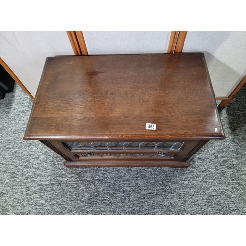 456 - Vintage solid oak tv cabinet in the priory design featuring a large drawer below which has a lead li... 