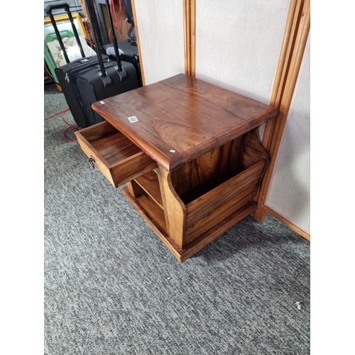 458 - Good quality solid Indian rosewood side table with a newspaper rack to both sides with a clean top w... 