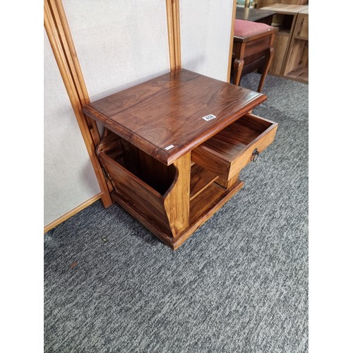 458 - Good quality solid Indian rosewood side table with a newspaper rack to both sides with a clean top w... 