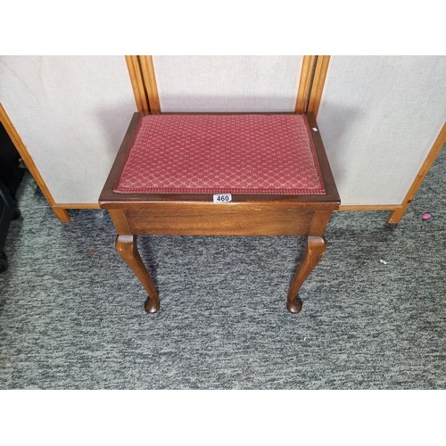 460 - Good quality solid mahogany storage piano stool having a clean pink upholstered top standing on cabr... 