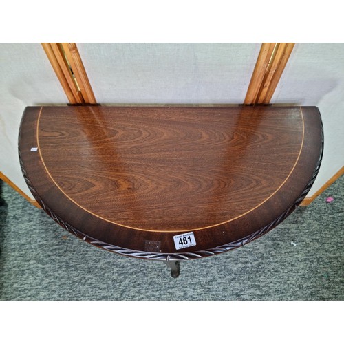 461 - Good quality mahogany demi lune hall table having a select mahogany top with string inlay standing o... 