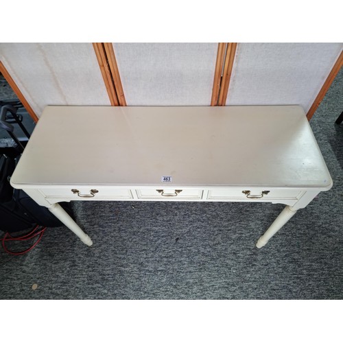 463 - Good quality genuine Laura Ashley cream painted console table with three drawers below the table is ... 