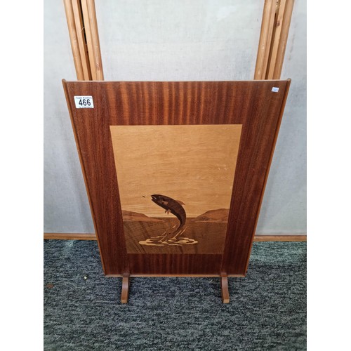 466 - Well made wooden fire screen with a large inlaid leaping salmon scene to the centre using different ... 