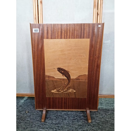 466 - Well made wooden fire screen with a large inlaid leaping salmon scene to the centre using different ... 