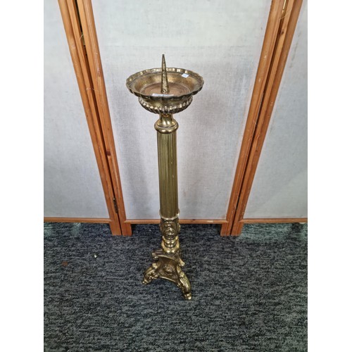 467 - Antique 19th century tall brass church sacred candle stick featuring a spike for a large pillar cand... 