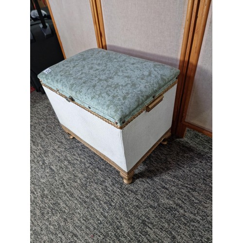 474 - Lloyd loom type linen storage stool with an upholstered cushion top in clean condition height 40cm l... 