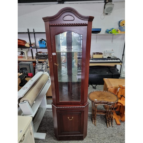 480 - Mahogany corner cabinet  in very clean condition having a glazed cabinet to the top with three shelv... 