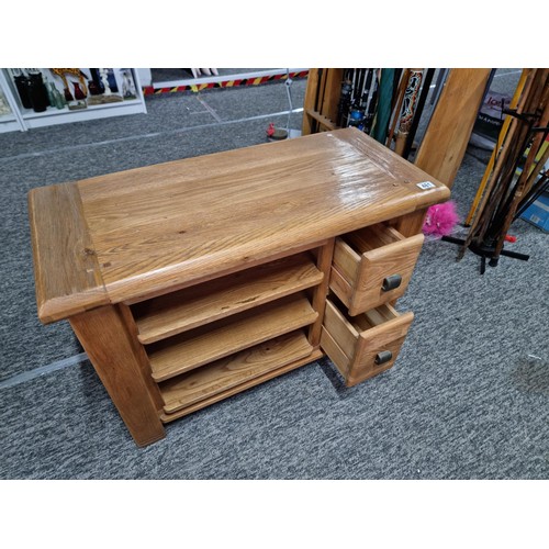 481 - Good quality modern chunky solid oak TV unit with three shelves and two short drawers made to a very... 