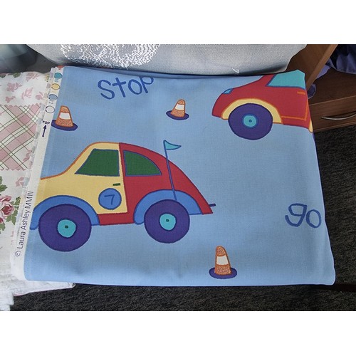 11 - Large quantity of Laura Ashley fabric inc many different designs and patterns inc children's pattern... 