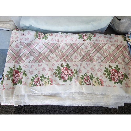11 - Large quantity of Laura Ashley fabric inc many different designs and patterns inc children's pattern... 