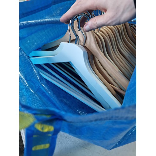 15 - Ikea bag containing a large quantity of as new wooden Ikea coat hangers, 35x in total to include 4x ... 