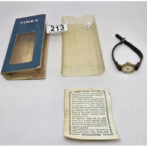 213 - A vintage Timex ladies wristwatch complete with its original box, outer box and paperwork, the guara... 
