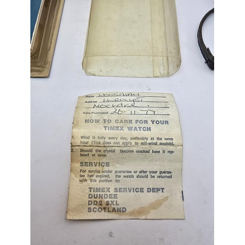 213 - A vintage Timex ladies wristwatch complete with its original box, outer box and paperwork, the guara... 