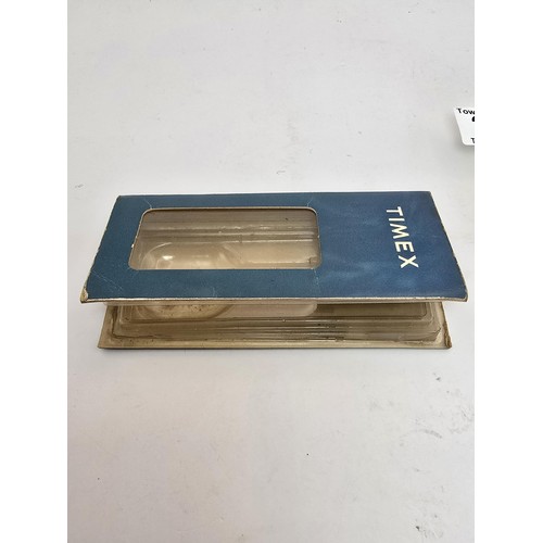 213 - A vintage Timex ladies wristwatch complete with its original box, outer box and paperwork, the guara... 