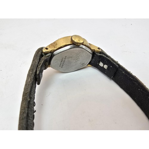 213 - A vintage Timex ladies wristwatch complete with its original box, outer box and paperwork, the guara... 