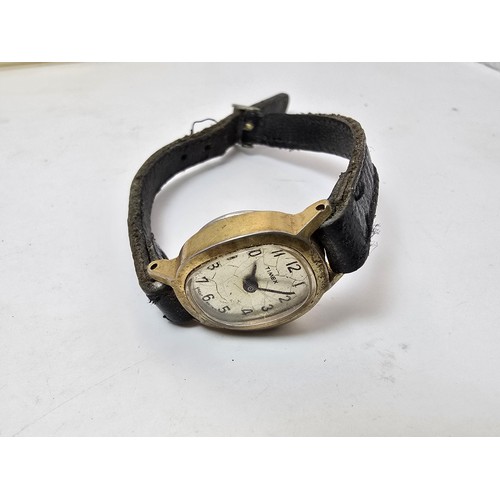 213 - A vintage Timex ladies wristwatch complete with its original box, outer box and paperwork, the guara... 