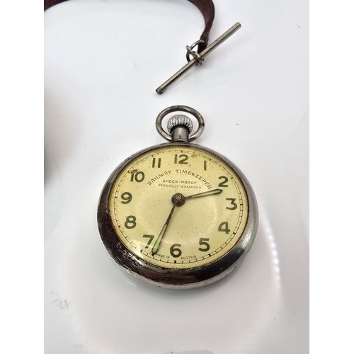 219 - A good vintage heavy duty brass miners pocket watch case complete with a railway timekeeper vintage ... 