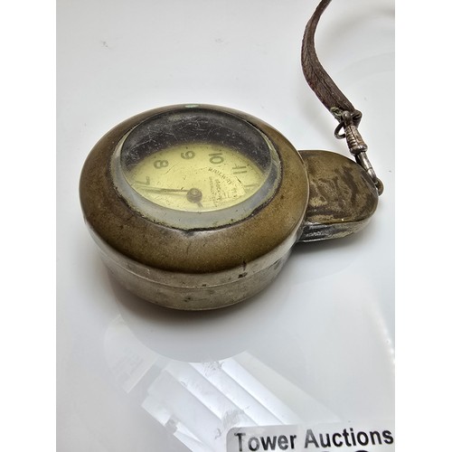 219 - A good vintage heavy duty brass miners pocket watch case complete with a railway timekeeper vintage ... 