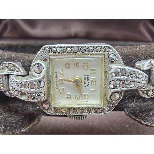 221 - A good quality vintage 1960's sterling silver ladies watch with an ornate design inset with marcasit... 