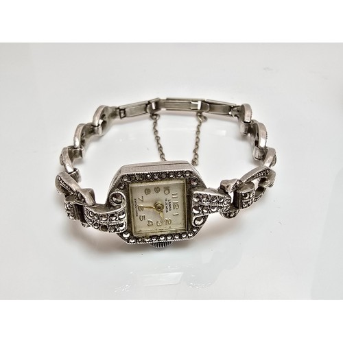 221 - A good quality vintage 1960's sterling silver ladies watch with an ornate design inset with marcasit... 