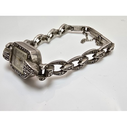 221 - A good quality vintage 1960's sterling silver ladies watch with an ornate design inset with marcasit... 
