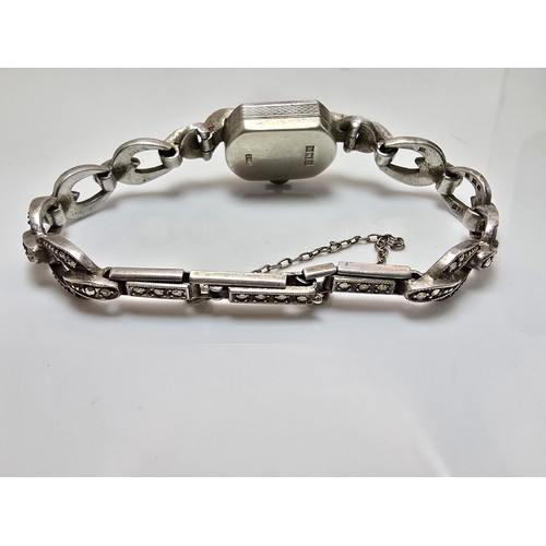 221 - A good quality vintage 1960's sterling silver ladies watch with an ornate design inset with marcasit... 