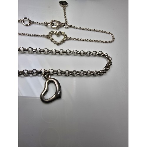 175 - 2x 925 silver bracelets, both having a heart charm design, both are in good clean condition, 1 brace... 