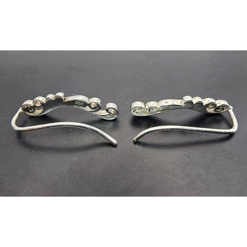 179 - A pair of ornate 925 silver drop earrings in a pierced chase design, in excellent clean condition an... 