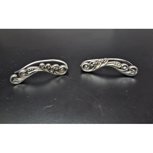 179 - A pair of ornate 925 silver drop earrings in a pierced chase design, in excellent clean condition an... 