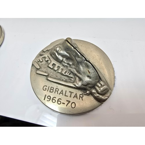 161 - A rare wooden cased set of 4 metal place card holders 
featuring the rock of Gibraltar dated 1966-70... 