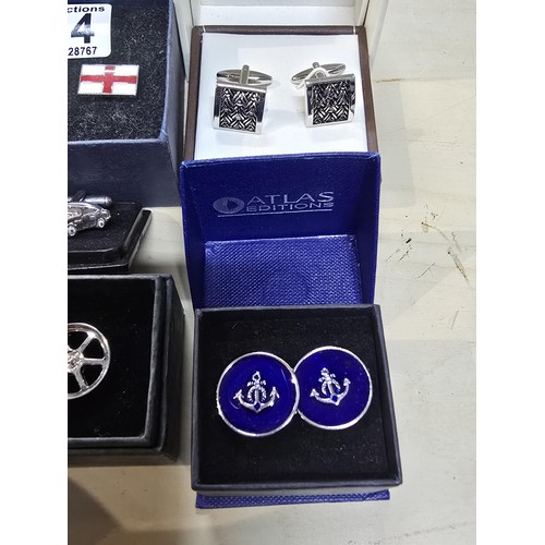 264 - A collection of 6x as new unused pairs of cuff links to include an attractive enamelled pair of cuff... 