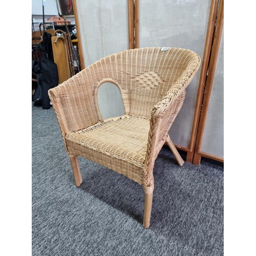 454 - A wicker armed chair in good overall condition, I deal for a bedroom or conservatory,