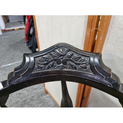 455 - An Edwardian corner chair, Ebonised wood, with a floral padded seat, lovely calving to the back, In ... 