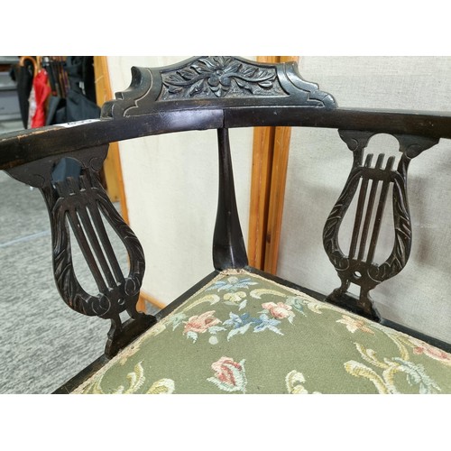 455 - An Edwardian corner chair, Ebonised wood, with a floral padded seat, lovely calving to the back, In ... 