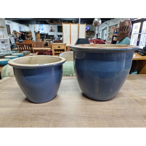 420 - 2x blue glaze stoneware planters in good order with drainage holes, largest measures 31cm high by 39... 