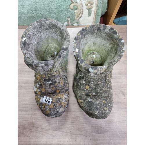 428 - 2x large vintage stone ware boot formed planters both are in good condition with no damage and displ... 