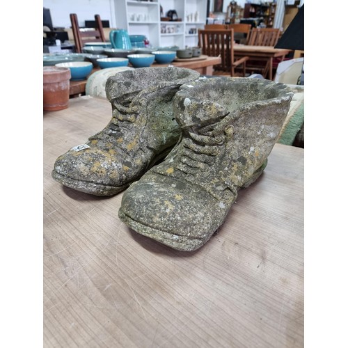 428 - 2x large vintage stone ware boot formed planters both are in good condition with no damage and displ... 